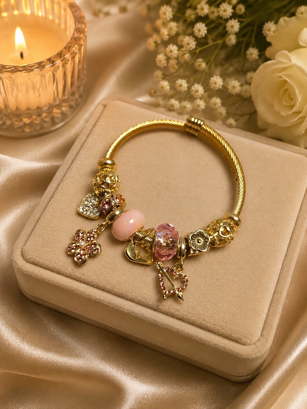 Gold-Plated Pink Charm Bracelet with Crystal Accents